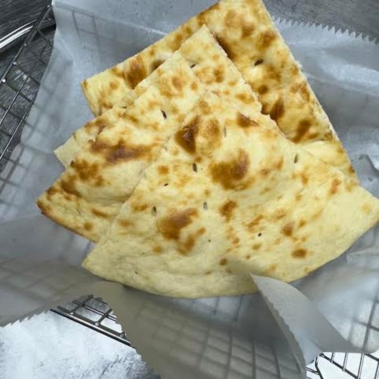 Savor our authentic naan