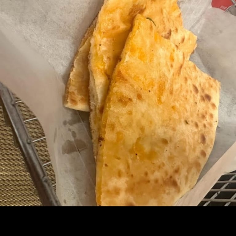 Savor our authentic naan